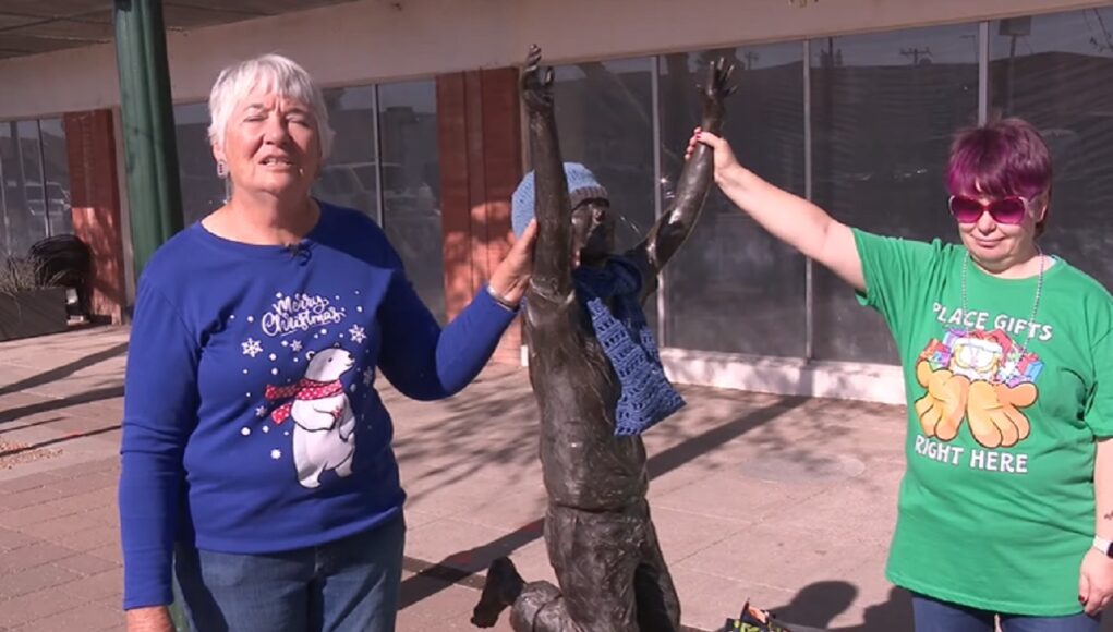 Mesa Community Kindness, Winter Charity Acts, Warmth Spreading Initiatives, Creative Winter Help, Heartfelt Gestures in Mesa, Holiday Kindness Stories, Community Support in Cold Months, Statue Scarf Project, Charitable Acts in Winter, Mesa Winter Warmth Project.