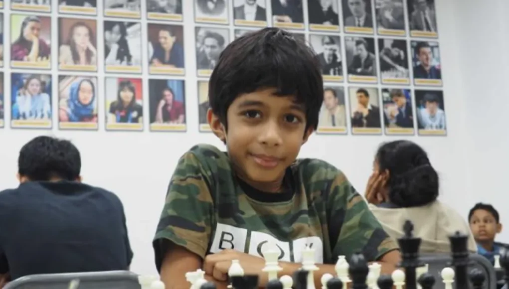 8-Year-Old Chess prodigy victory, Young chess master achievements, Historic chess wins, Child chess champions, Chess talent development, ChessKid online learning, Grandmaster chess upsets, Youth chess competitions, Chess strategy for kids, Inspirational young chess players