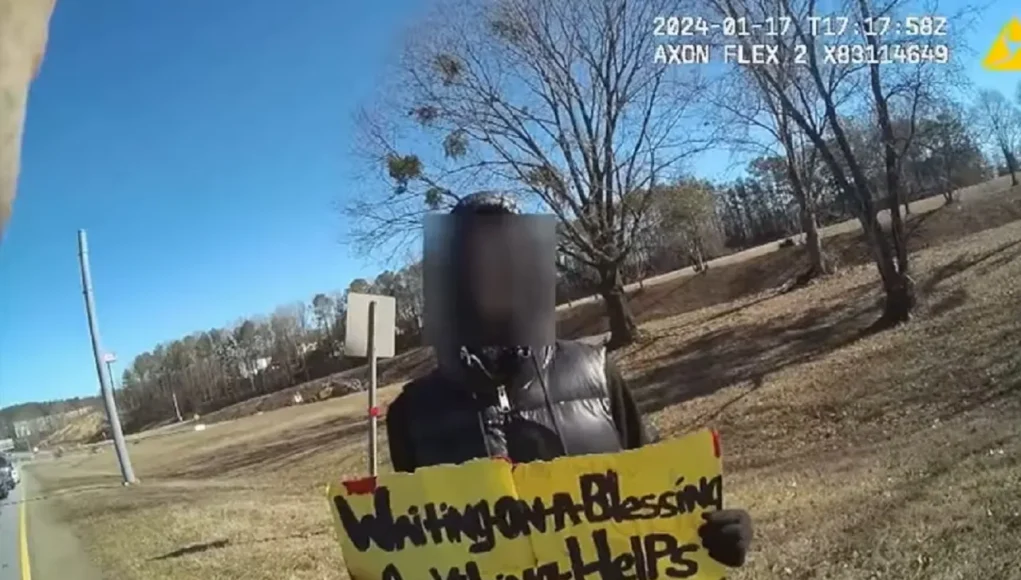 homeless shelters Gwinnett County, cold weather gear for homeless, acts of kindness by police officers, helping homeless during winter, Gwinnett County homeless resources, body camera footage positive police interaction, preventing frostbite for homeless, how to donate to homeless shelters, police officer helps homeless man viral story, making a difference in your community