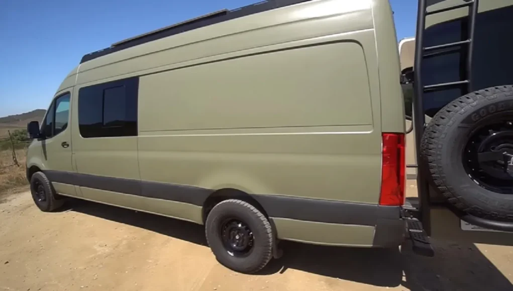 Compact living camper van, Innovative camper van designs, Elevator bed in camper van, Van life space-saving ideas, Small space living tips, Minimalist living in a van, Camper van interior design, Full-time van life inspiration, Multifunctional camper van features, Smart storage solutions for vans