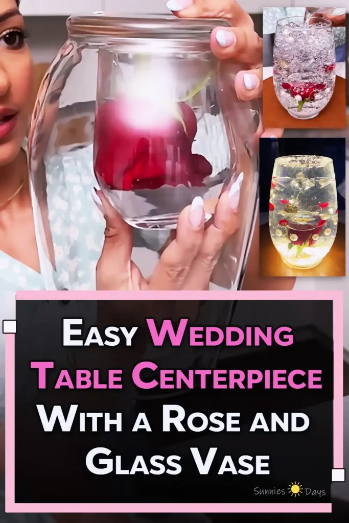 A DIY wedding table centerpiece made with a red flower inside a glass vase with water, styled as a simple elegant floral decoration for wedding or reception tables.