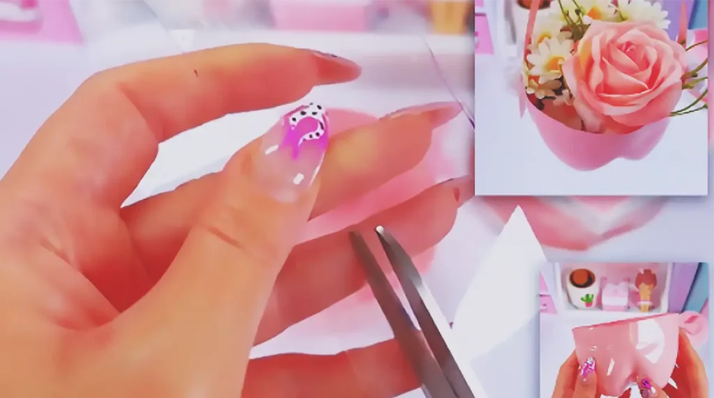 A handmade aesthetic desk decor craft made from a recycled plastic bottle and cardboard, designed as a cute DIY room decor idea using waste materials.