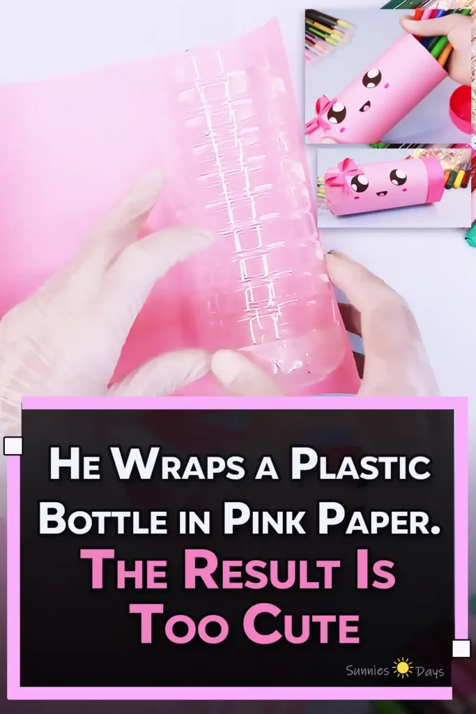 A cute pink pencil case made from a recycled plastic bottle, decorated with a kawaii face, bow, and filled with colorful markers for a DIY school supplies craft.